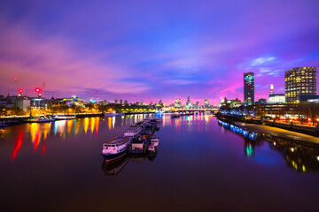 Southbank of river Thames in London at sunrise. England