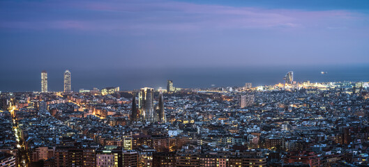Fototapeta na wymiar Aerial view of Barcelona at dusk. Spain