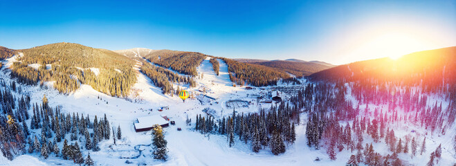 Panorama Sheregesh ski resort in winter, landscape on mountain and hotels, aerial top view Kemerovo...