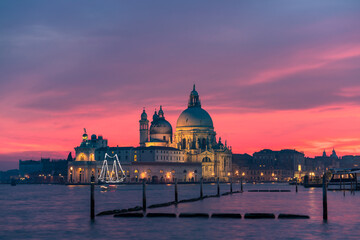 Fototapeta na wymiar Santa Maria della Salute cathedral at beautiful sunset in Venice, Italy 
