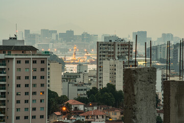 Iron part of the beams of the initial stage of a construction, and a large urban city in the...