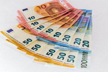 Euro banknotes isolated over white with clipping path