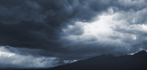 Dark blue dramatic sky with stormy clouds - obrazy, fototapety, plakaty
