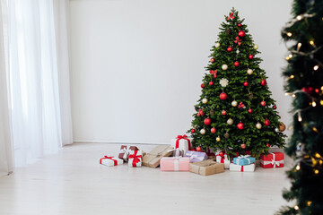 Interior on New Year holiday gifts Christmas tree decor