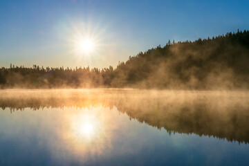 Sunrsise at the lake with morning fog
