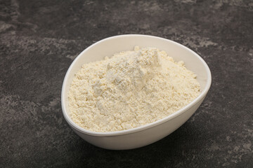 Wheat flour heap in the bowl