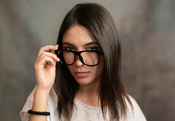 Portrait of woman wearing glasses. Selective focus.