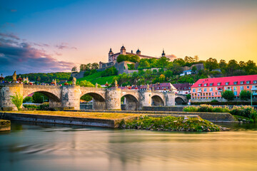 Marienberg Fortress and the Old Main Bridge on colorful sunset. Wurzburg, Bavaria, Germany