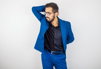 Handsome bearded teenager in suit wearing glasses! Happy businessman, young man dealing with education!
