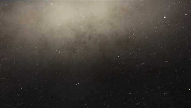 Exploration of galaxies through outer space towards a bright milky-way galaxy. 4K looping animation of flying through bright nebulae, clouds, and star fields. 