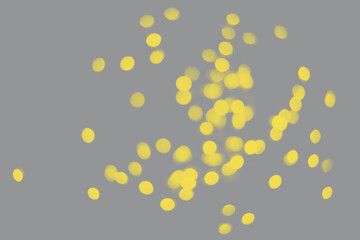 Blurred yellow sparkles on the grey background. Trendy colors. Yellow and Gray. Demonstrating Color 2021.