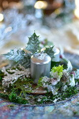 Glossy decorative headdress for the festive table in silver and white colors, richly decorated.