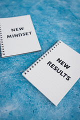 law of attraction, notepad with New Mindset New Results text