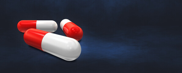 Capsule pill on a dark blue studio banner