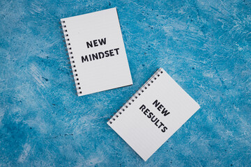 law of attraction, notepad with New Mindset New Results text