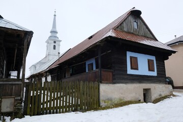 Interesting traditional wooden buildings in Sumiac (Šumiac) village, lying at feet of Kralova hola in Low Tatras in Slovakia © Iwona