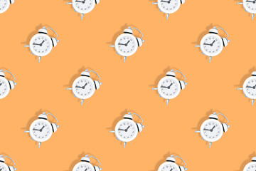 Alarm clocks seamless pattern. Alarm clocks background.
