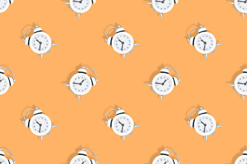 Alarm clocks seamless pattern. Alarm clocks background.