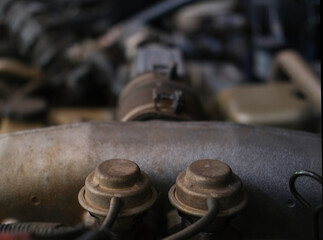 Photo of the engine of the car parked at the auto repair center