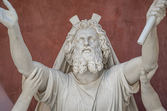 Old statue with prophets in Judaism Moses, Aaron and Hur at the old Church of Peace (Friedenskirche), located at Sanssouci City Park entrance in Potsdam, Germany