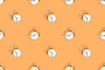 Alarm clocks seamless pattern. Alarm clocks background.