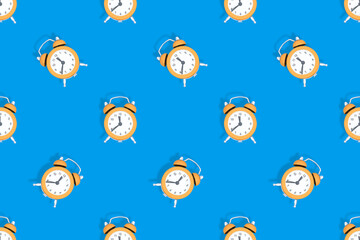 Alarm clocks seamless pattern. Alarm clocks background.