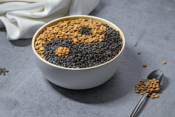 Lentils in a bowl. Creative food concept. Yin Yang