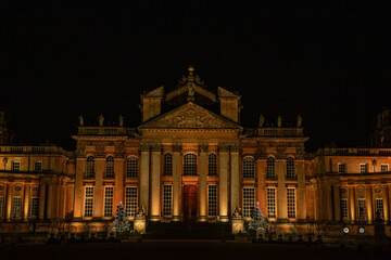 Fototapeta premium Stately home in Oxfordshire illuminated for Christmas as part of the Christmas light trail.
