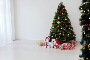 Interior on New Year holiday gifts Christmas tree decor