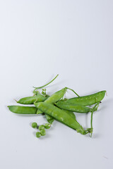 Kacang kapri or Sugar Pea, Pisum sativum isolated on a white background.