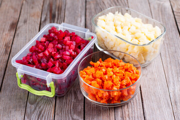 Chopped vegetables in containers. Storage of prepared foods in plastic container. Vegetables for further freezing