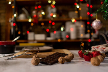 Vegan chef girl cooking sweets in christmas kitchen making chocolates and cookies for christmas
