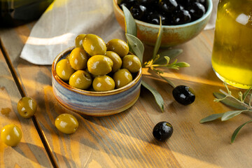 Olives and olive oil in studio