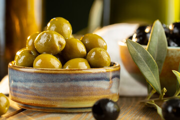 Olives and olive oil in studio