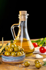 Olives and olive oil in studio