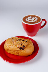 cup of coffee and a bun