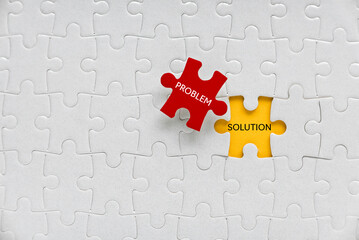 Top view of a jigsaw puzzle written with Problem and Solution.