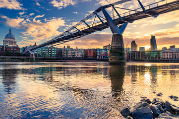 Millennium Bridge and Saint Paul's Cathedral in central London at sunrise