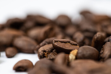 Black coffee beans on a white background