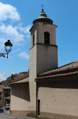 Fototapeta na wymiar Big bell tower at Parish of Sant'Egidio Abate - Tolfa,Italy