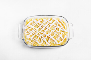 Grated boiled potato and mayonnaise added as the third layer. Step by step recipe of Shuba salad. Step 4
