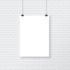 White poster on brick wall