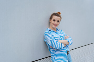 Confident laid-back woman with friendly smile