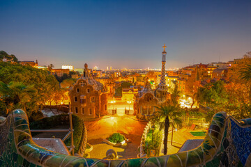 Fototapeta na wymiar Park Guell at night in Barcelona. Park was built from 1900 to 1914 and was officially opened as a public park in 1926. In 1984, UNESCO declared the park a World Heritage Site