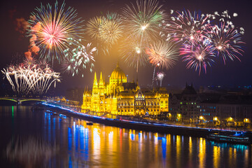 Fototapeta na wymiar Fireworks display at Hungarian Parliament in Budapest