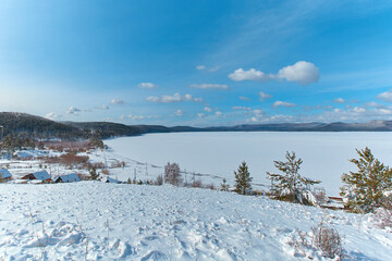 Fototapeta na wymiar A view of the lake Turgoyak in the winter. Chelyabinsk region, Miass city