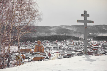 Memorial cross on the mountain in the village of Turgoyak. Chelyabinsk region, Russia