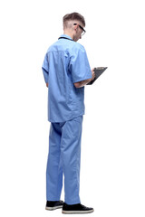 side view. doctor with clipboard looking at you .