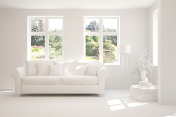 White living room with sofa and summer landscape in window. Scandinavian interior design. 3D illustration