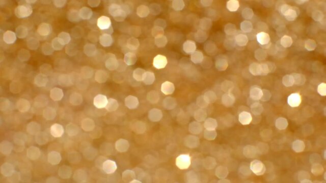 glitter glow background.  gold shiny texture. Christmas background